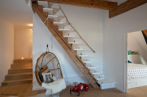  Make a new looking of your staircase with a vertical rope.