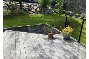 Filet de détente de forme atypique LOFTNETS prolongeant une terrasse bois