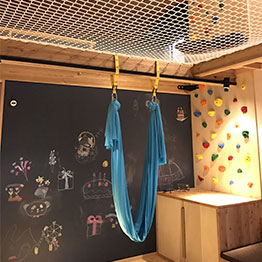 Fun play room for children with safety net