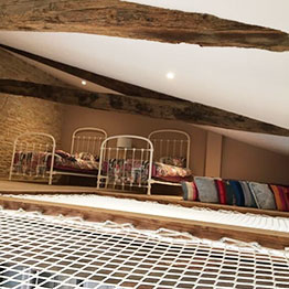 Bedroom with light shaft and loft net