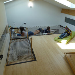 Children's play room with suspended floor net