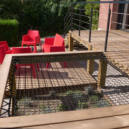 terrace wood with a sunbed net